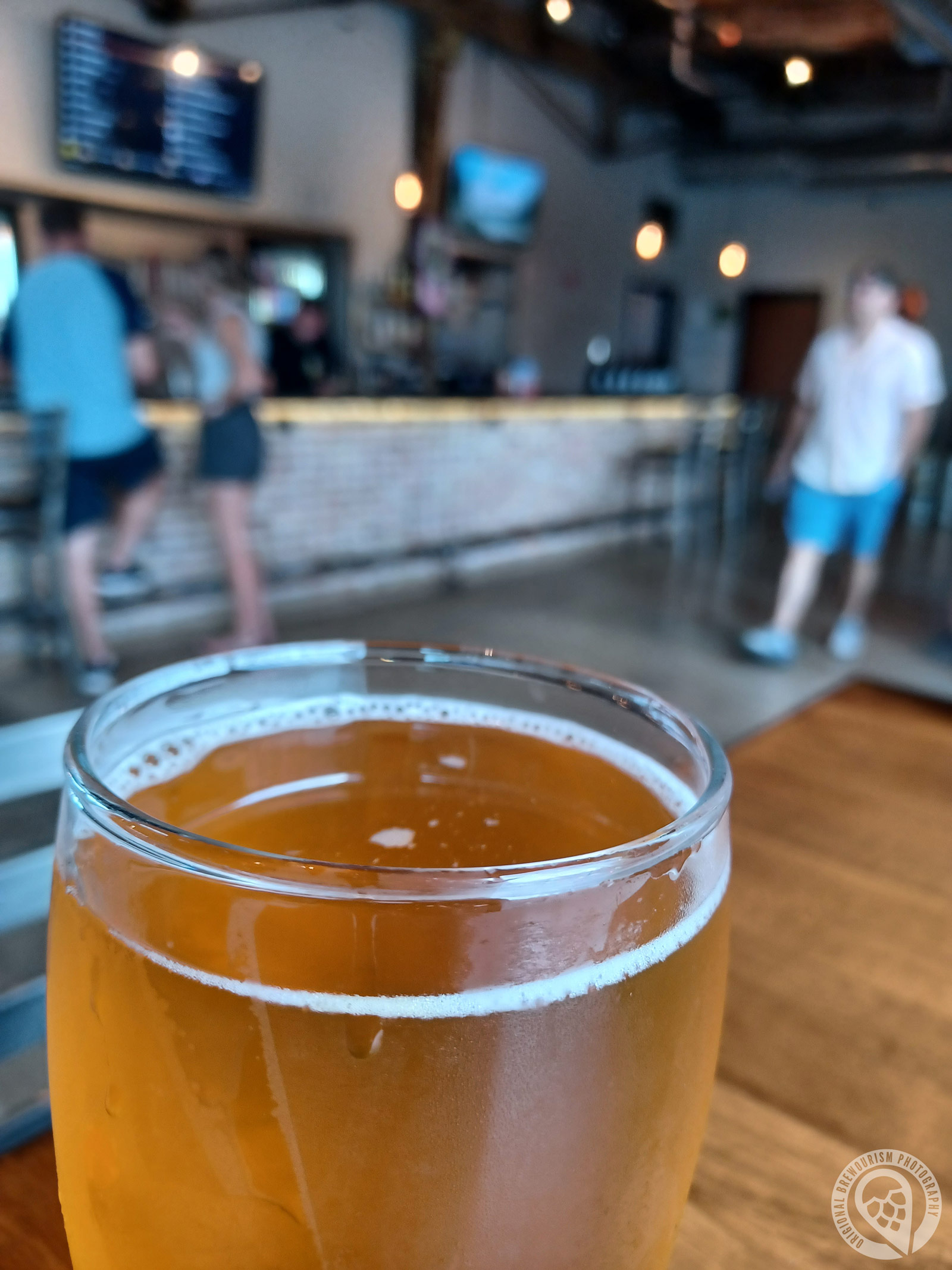 Glass of beer on table at Midwest Ale Works