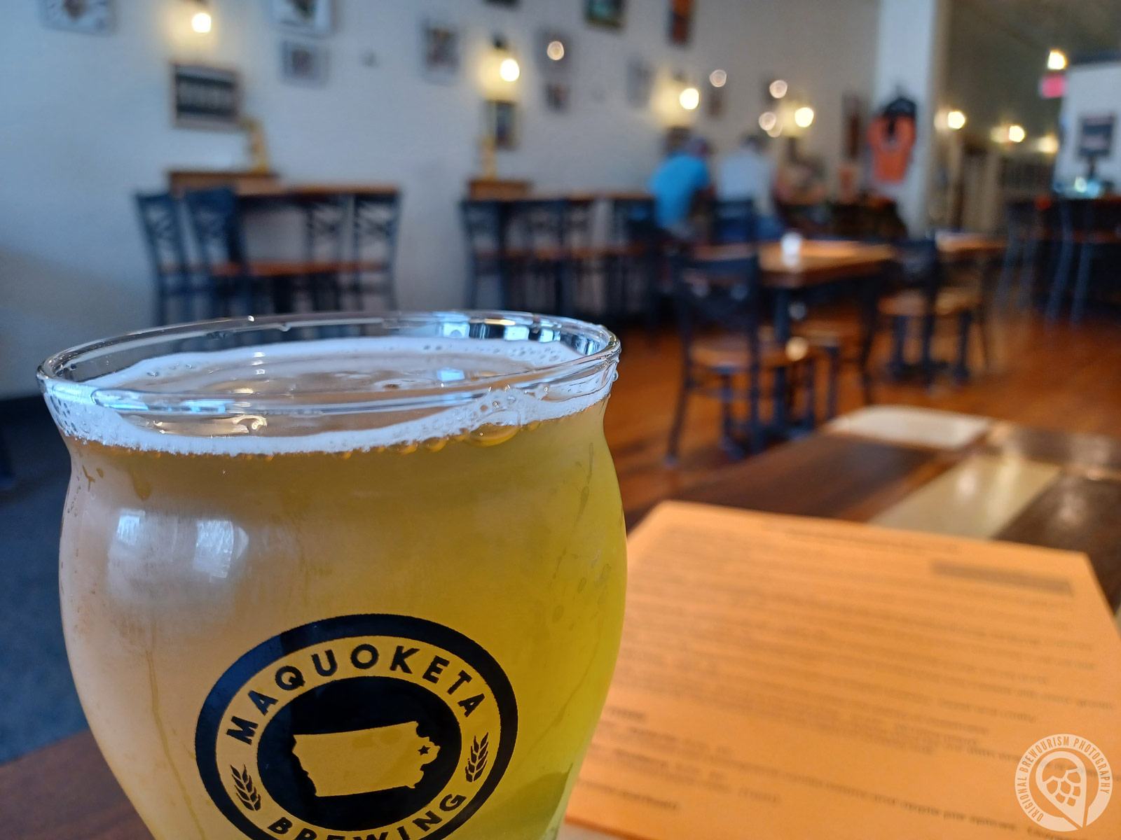 close up photo of pint of beer from Maquoketa Brewing