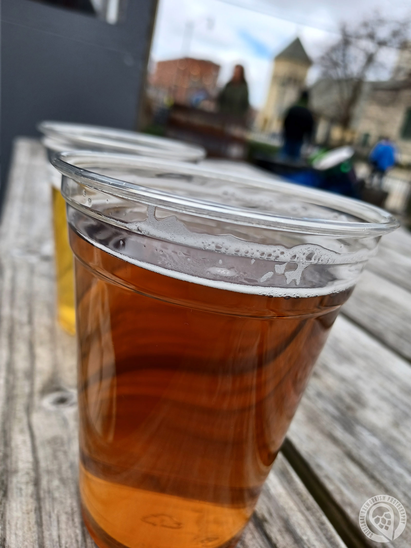 Cups of beer on a picnic table at Obed and Isaac Microbrewery